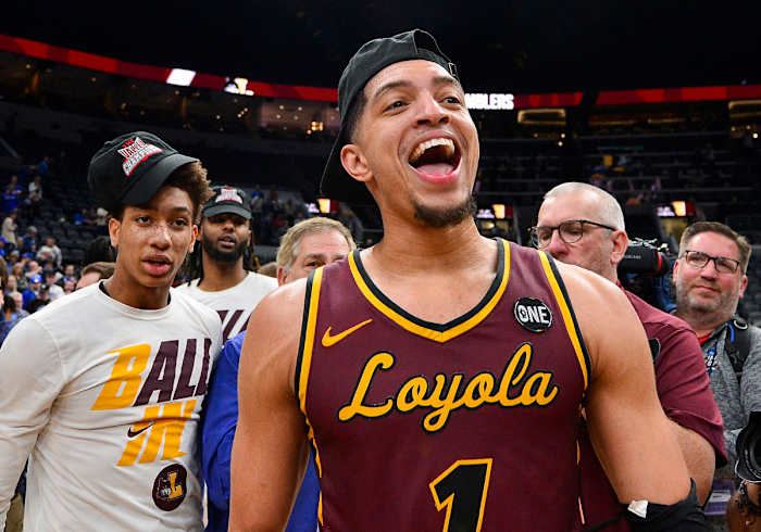 Loyola Ramblers guard Lucas Williamson (1) celebrates after the Ramblers defeated the Drake Bulldogs in the finals of the Missouri Valley Conference Tournament at Enterprise Center.